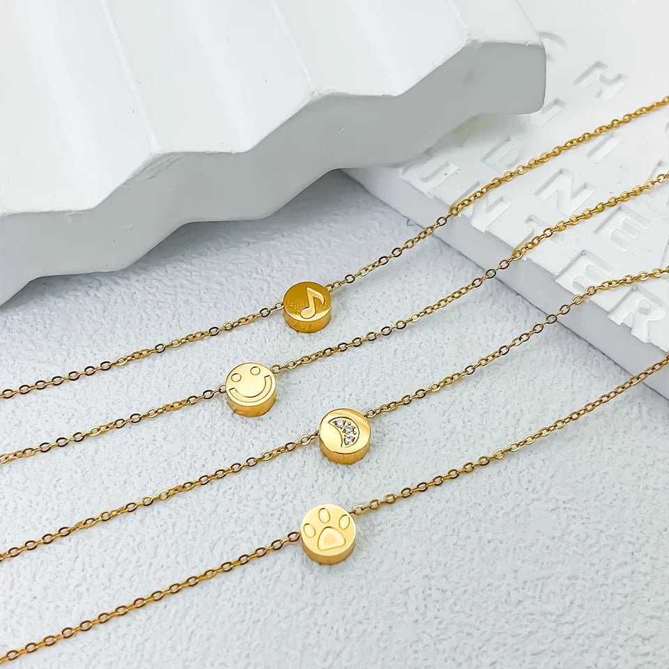 Modessie Stainless Steel Chain Bracelet – Gold or Silver Plated with Round Charm – 20 Design Options