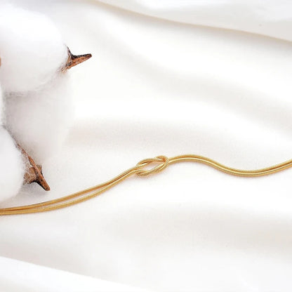 Modessie Fashion High Quality Stainless Steel Gold Plated Bracelets Classic Round Snake Chain Knotted Simple Accessories